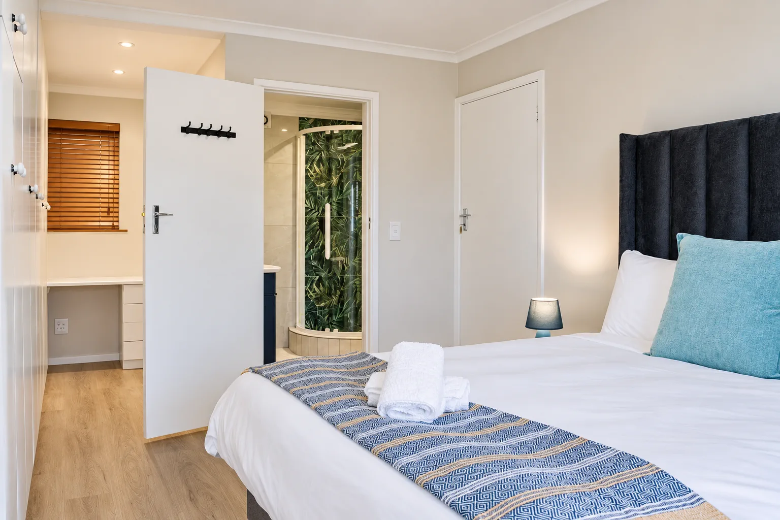 Bedroom 1 and its tropical en-suite