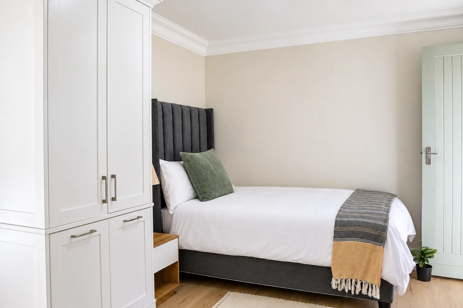 Bedroom 2, single bed and wardrobe